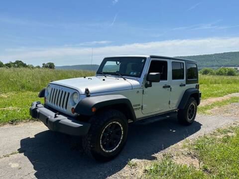 2012 Jeep Wrangler Unlimited for sale at Stepps Auto Sales in Shamokin PA