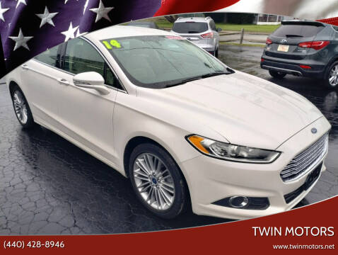 2014 Ford Fusion for sale at TWIN MOTORS in Madison OH