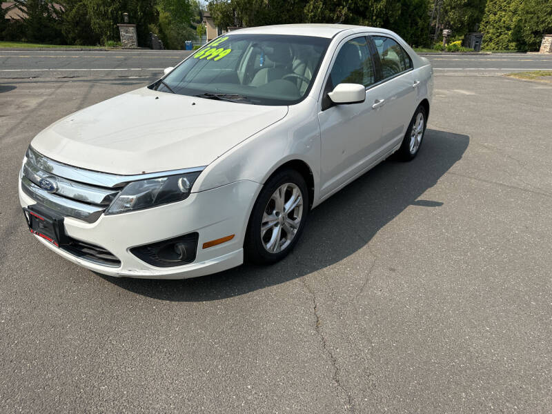 K & J AUTOMOTIVE, INC Car Dealer in Wolcott, CT