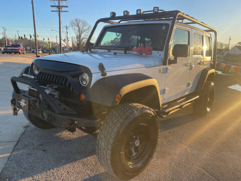 2012 Jeep Wrangler Unlimited for sale at R & J Auto Sales in Ardmore AL