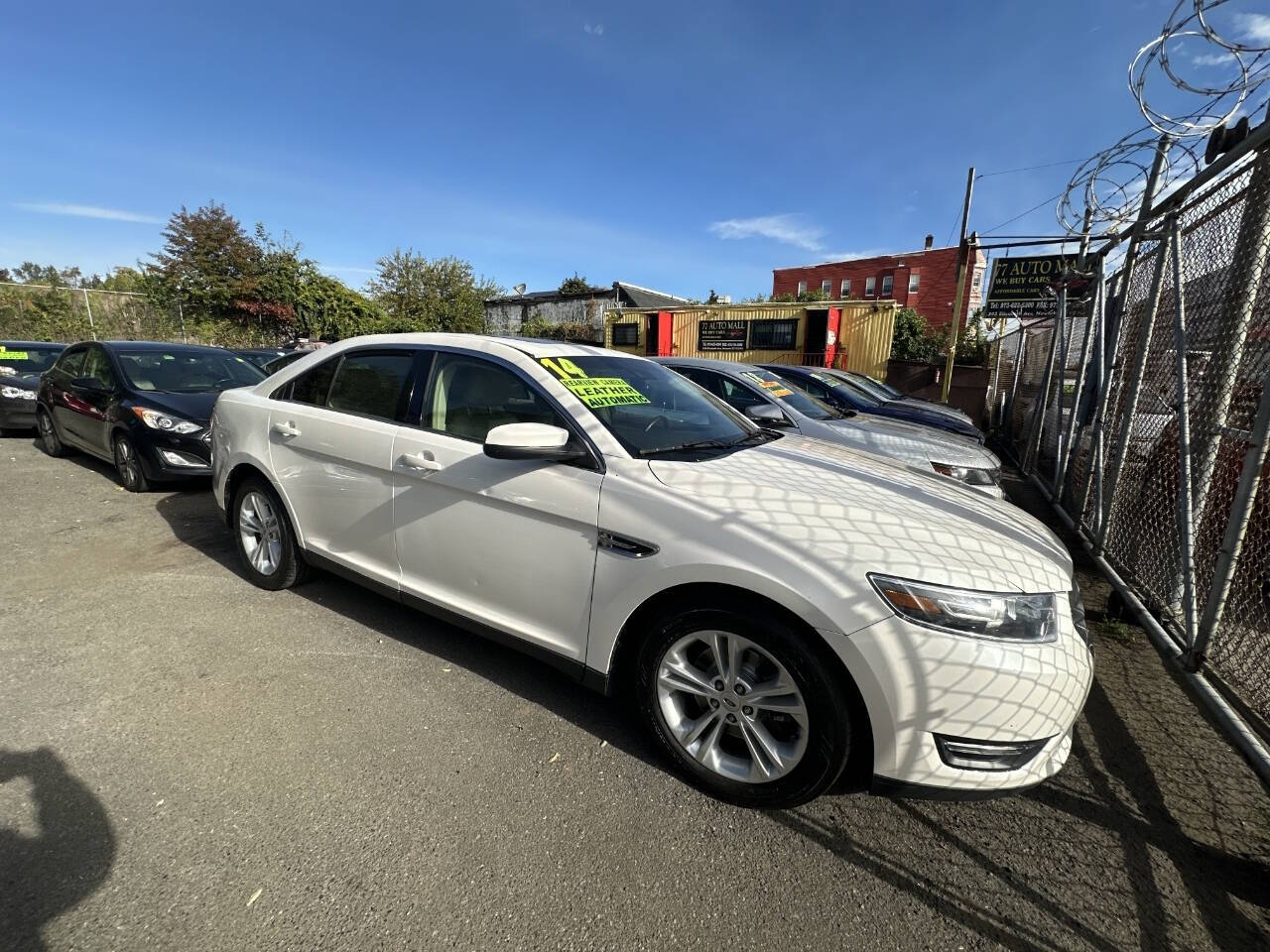 2014 Ford Taurus for sale at 77 Auto Mall in Newark, NJ