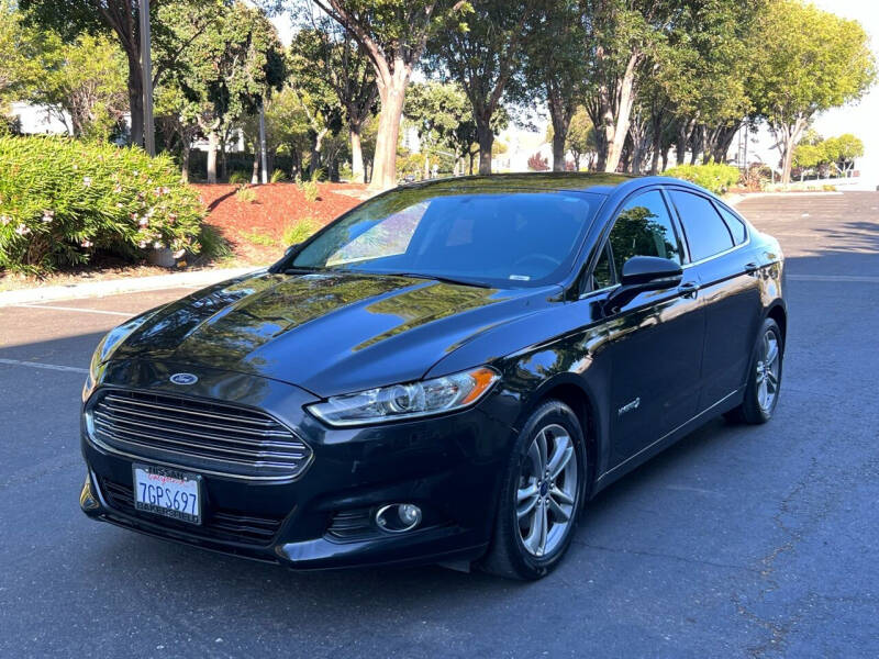 2015 Ford Fusion Hybrid for sale at ELYA MOTORS in Newark CA