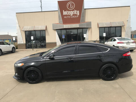 2014 Ford Fusion for sale at Integrity Auto Group in Wichita KS