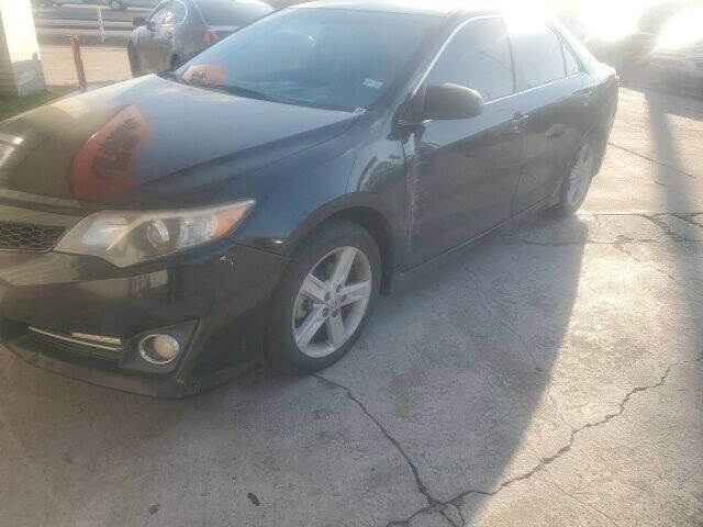 2014 Toyota Camry for sale at FREDYS CARS FOR LESS in Houston TX