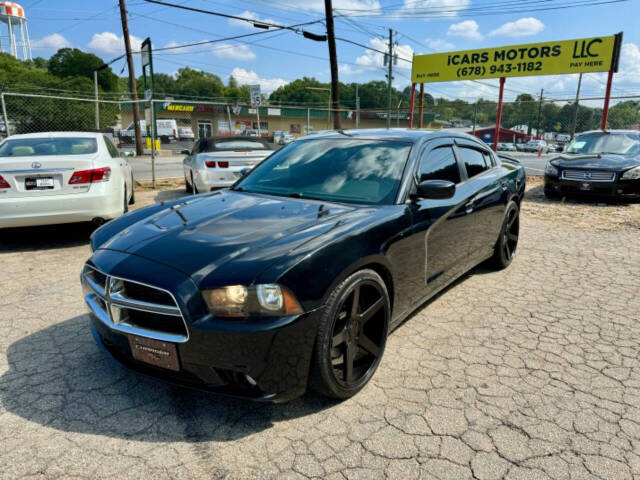 2013 Dodge Charger for sale at ICars Motors LLC in Gainesville, GA