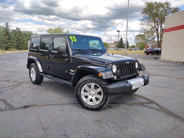 2015 Jeep Wrangler Unlimited for sale at Lasco of Grand Blanc in Grand Blanc MI