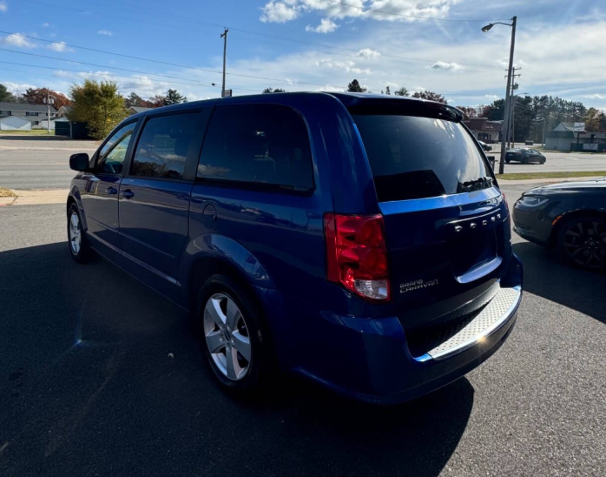 2013 Dodge Grand Caravan for sale at SIGNATURE AUTOS LLC in Weston, WI