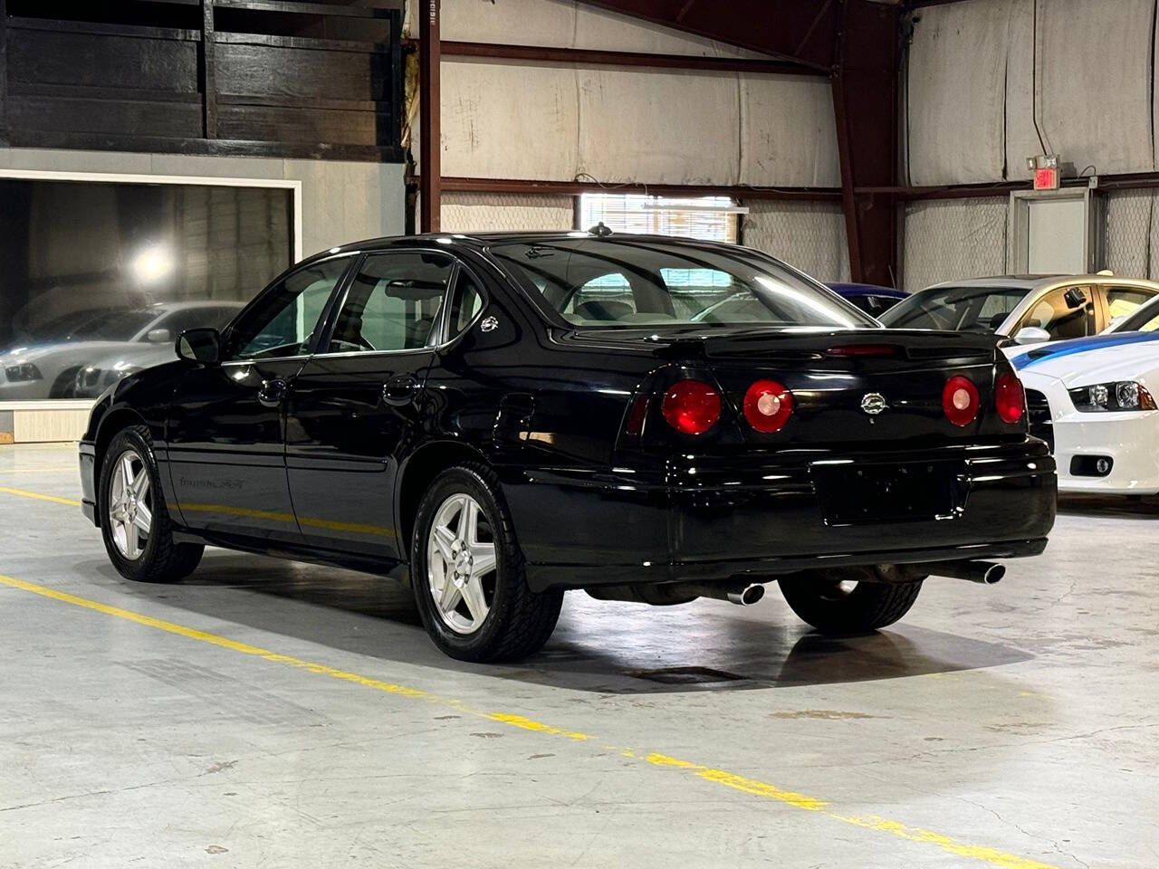 2004 Chevrolet Impala for sale at Carnival Car Company in Victoria, TX