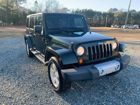 2011 Jeep Wrangler Unlimited for sale at Sanford Autopark in Sanford NC