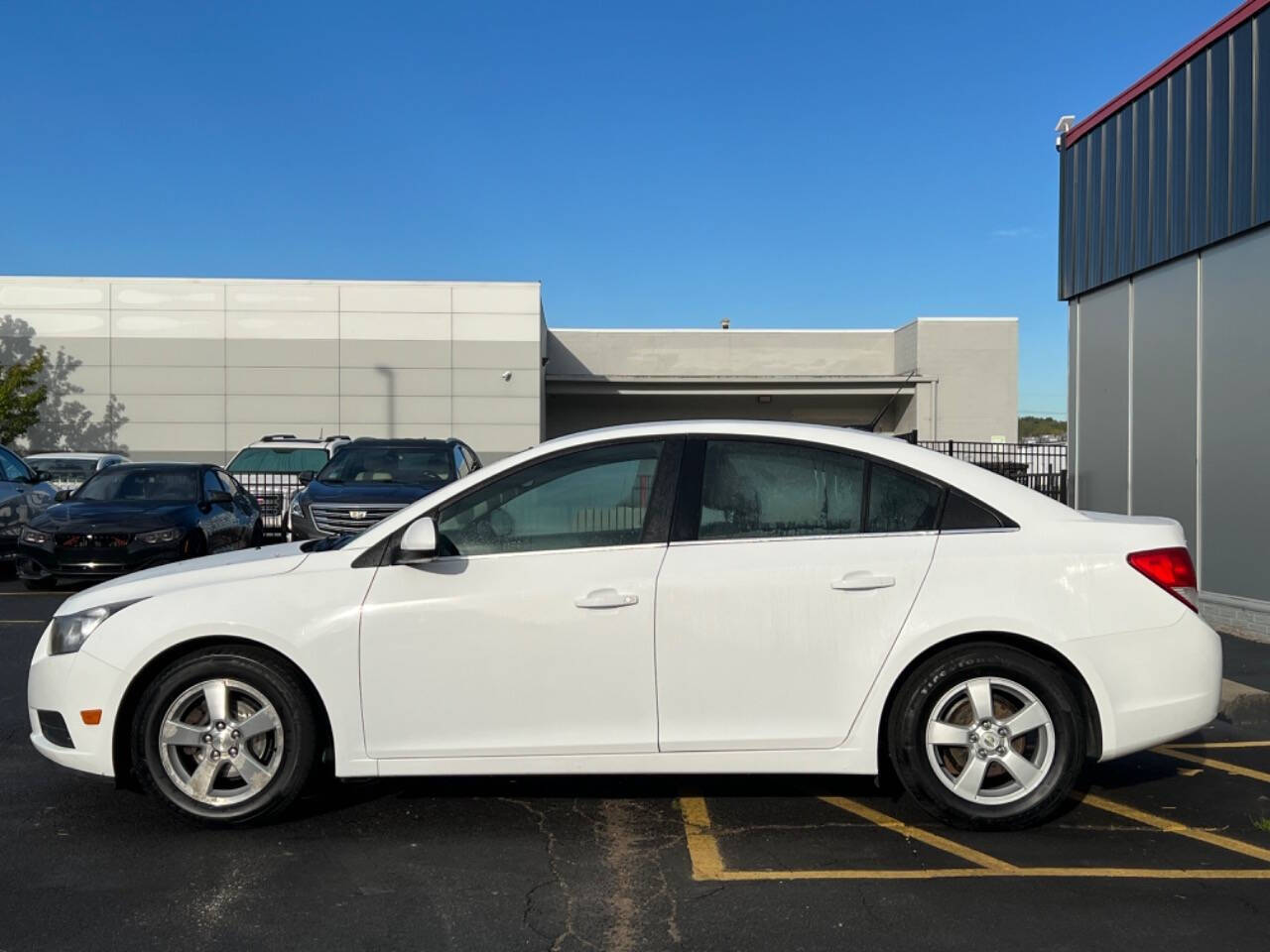 2014 Chevrolet Cruze for sale at Carventure in Lansing, MI