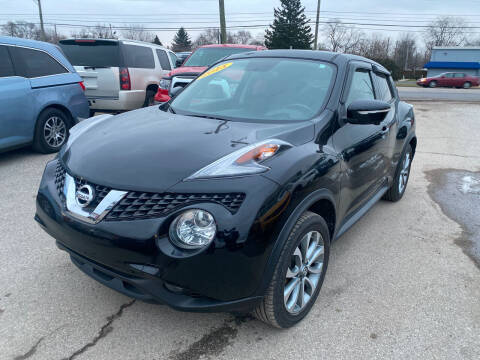 2015 Nissan JUKE for sale at Unique Auto Group in Indianapolis IN