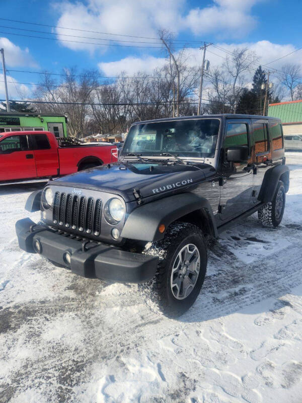 2014 Jeep Wrangler Unlimited for sale at Johnny's Motor Cars in Toledo OH