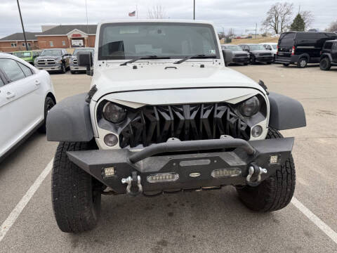 2016 Jeep Wrangler Unlimited for sale at Postal Pete in Galena IL