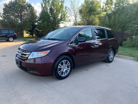 2013 Honda Odyssey for sale at QUEST MOTORS in Englewood CO