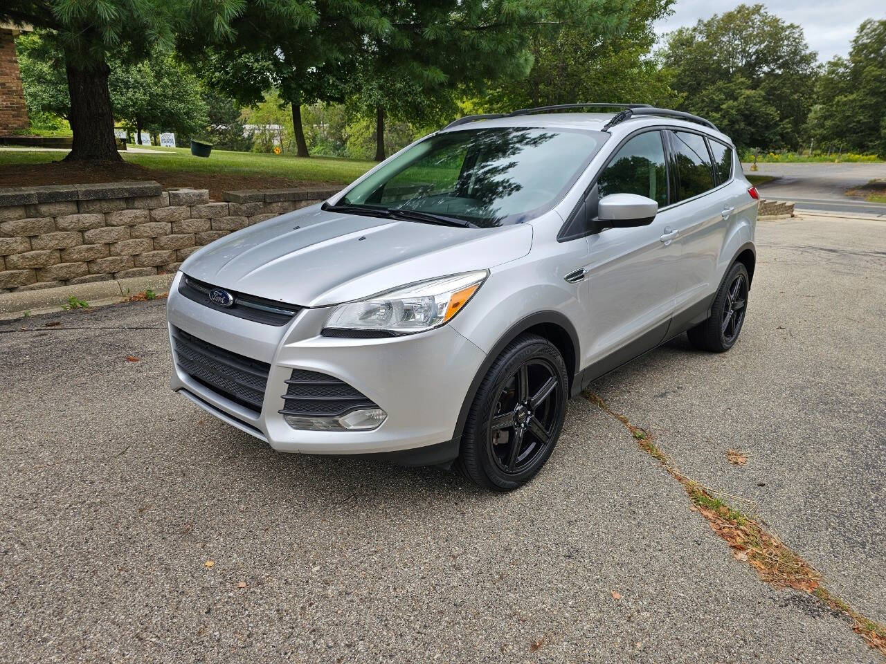 2013 Ford Escape for sale at WAGNER AUTO MART LLC in Ann Arbor, MI