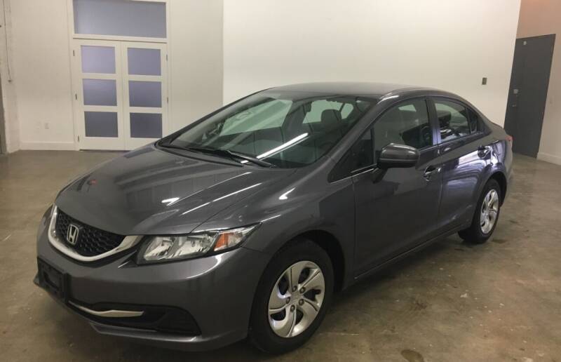2015 Honda Civic for sale at CHAGRIN VALLEY AUTO BROKERS INC in Cleveland OH