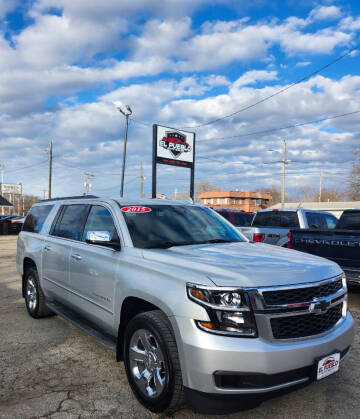 2015 Chevrolet Suburban for sale at El Pueblo Auto Sales in Des Moines IA