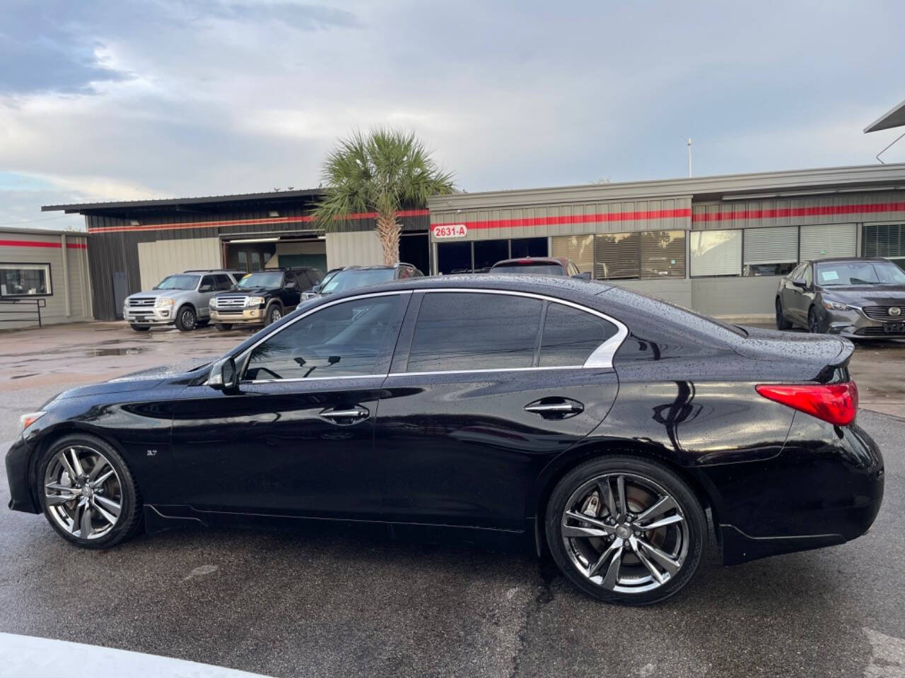 2014 INFINITI Q50 for sale at SMART CHOICE AUTO in Pasadena, TX