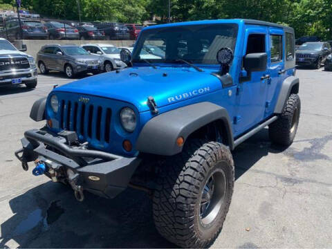 2010 Jeep Wrangler Unlimited for sale at J & M Automotive in Naugatuck CT