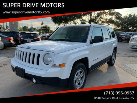 2014 Jeep Patriot for sale at SUPER DRIVE MOTORS in Houston TX