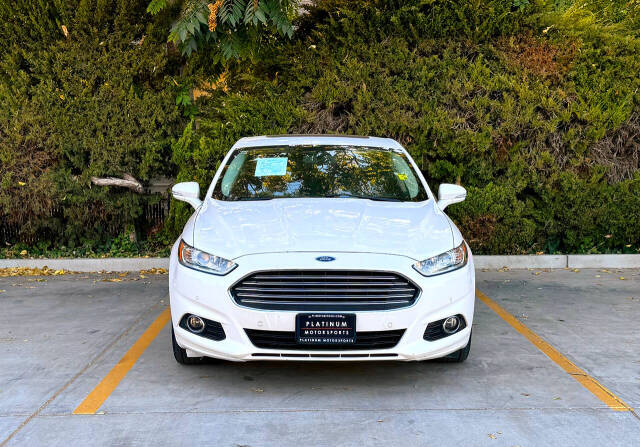 2014 Ford Fusion Hybrid for sale at Platinum motorsports in Patterson, CA