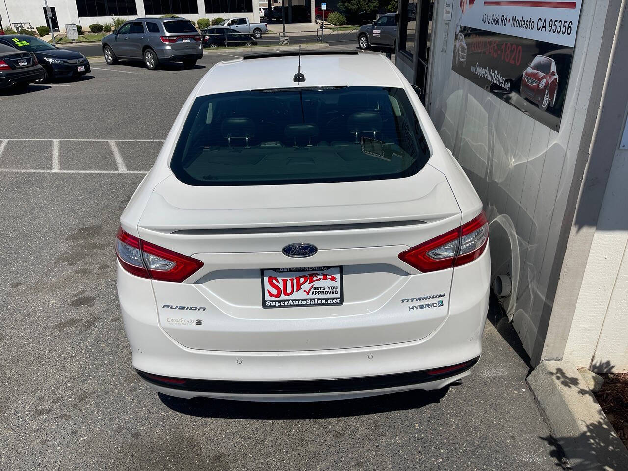 2014 Ford Fusion Hybrid for sale at Super Auto Sales Modesto in Modesto, CA