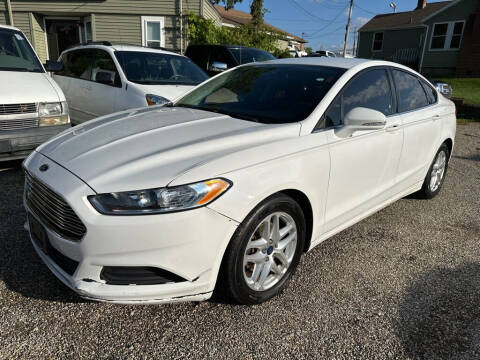 2016 Ford Fusion for sale at TIM'S AUTO SOURCING LIMITED in Tallmadge OH