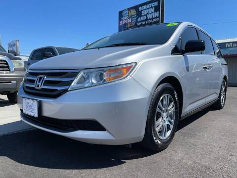 2013 Honda Odyssey for sale at MAGIC AUTO SALES, LLC in Nampa ID