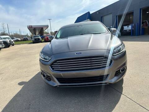 2013 Ford Fusion Hybrid for sale at D & J's Automotive Sales LLC in Olathe KS