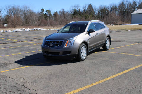 2011 Cadillac SRX for sale at Caruzin Motors in Flint MI