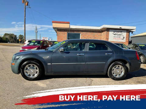 2007 Chrysler 300 for sale at Autocom, LLC in Clayton NC