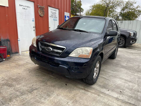 2009 Kia Sorento for sale at Trevino's Auto Sales in San Antonio TX