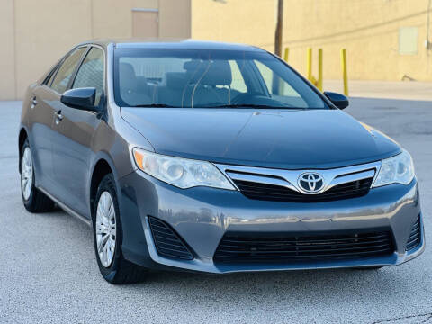 2014 Toyota Camry for sale at Signature Motor Group in Glenview IL