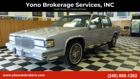 1988 Cadillac DeVille for sale at Farmington's Finest Used Autos - Yono Brokerage Services, INC in Farmington MI