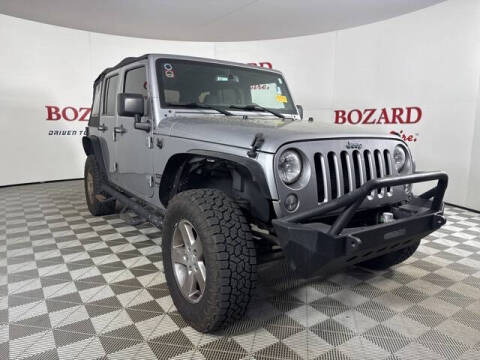2017 Jeep Wrangler Unlimited for sale at BOZARD FORD in Saint Augustine FL