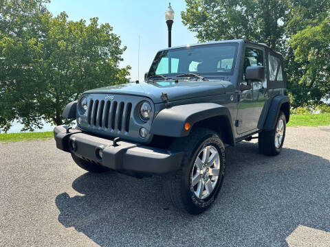 2014 Jeep Wrangler for sale at PUTNAM AUTO SALES INC in Marietta OH