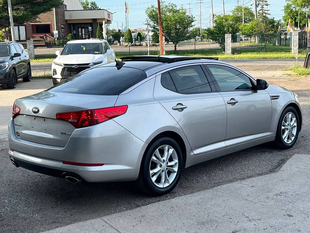 2013 Kia Optima for sale at Spartan Elite Auto Group LLC in Lansing, MI