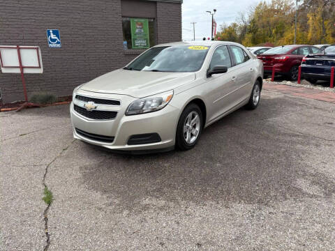 2013 Chevrolet Malibu for sale at George's Used Cars in Brownstown MI