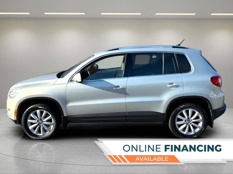 Used 2011 Volkswagen Tiguan SE with VIN WVGBV7AX3BW522678 for sale in Louisburg, NC