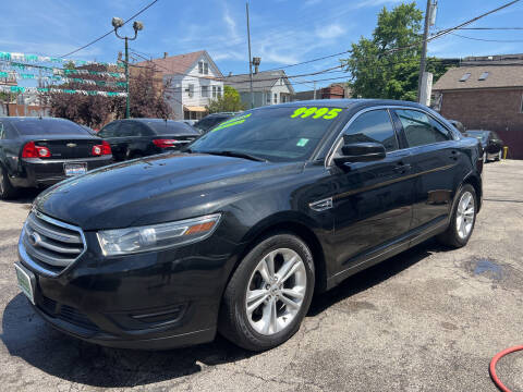 2015 Ford Taurus for sale at Barnes Auto Group in Chicago IL