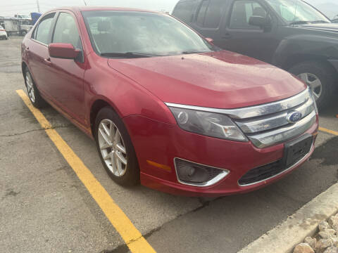 2012 Ford Fusion for sale at BELOW BOOK AUTO SALES in Idaho Falls ID