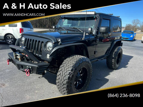 2014 Jeep Wrangler for sale at A & H Auto Sales in Greenville SC