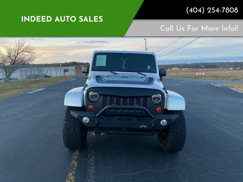 2012 Jeep Wrangler Unlimited for sale at Indeed Auto Sales in Lawrenceville GA