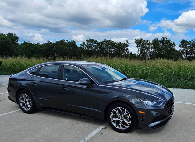 2021 Hyundai SONATA for sale at CAR MARKET AUTO GROUP in Sugar Land, TX