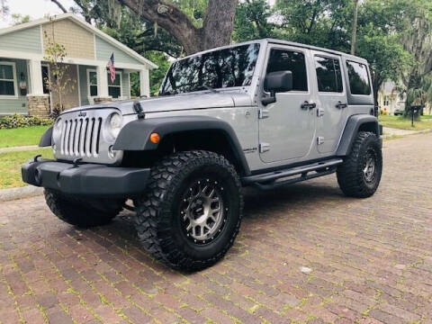 2014 Jeep Wrangler Unlimited for sale at CHECK AUTO, INC. in Tampa FL