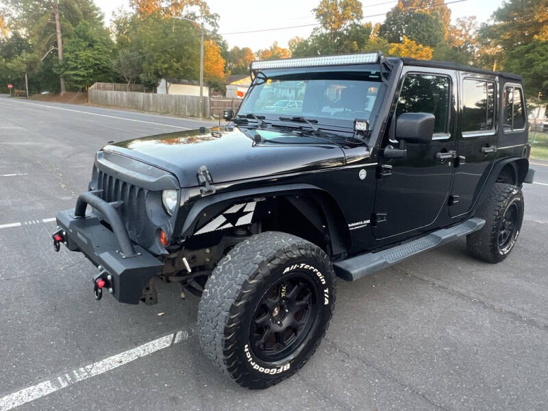 2011 Jeep Wrangler Unlimited for sale at Global Imports of Dalton LLC in Dalton GA