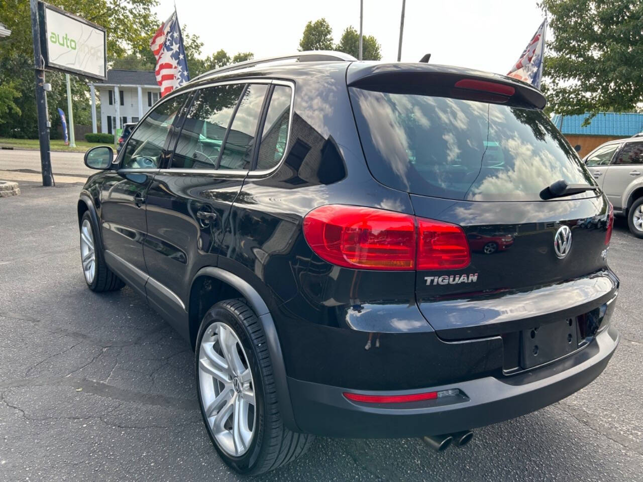 2013 Volkswagen Tiguan for sale at Auto Shop in Wyoming, MI