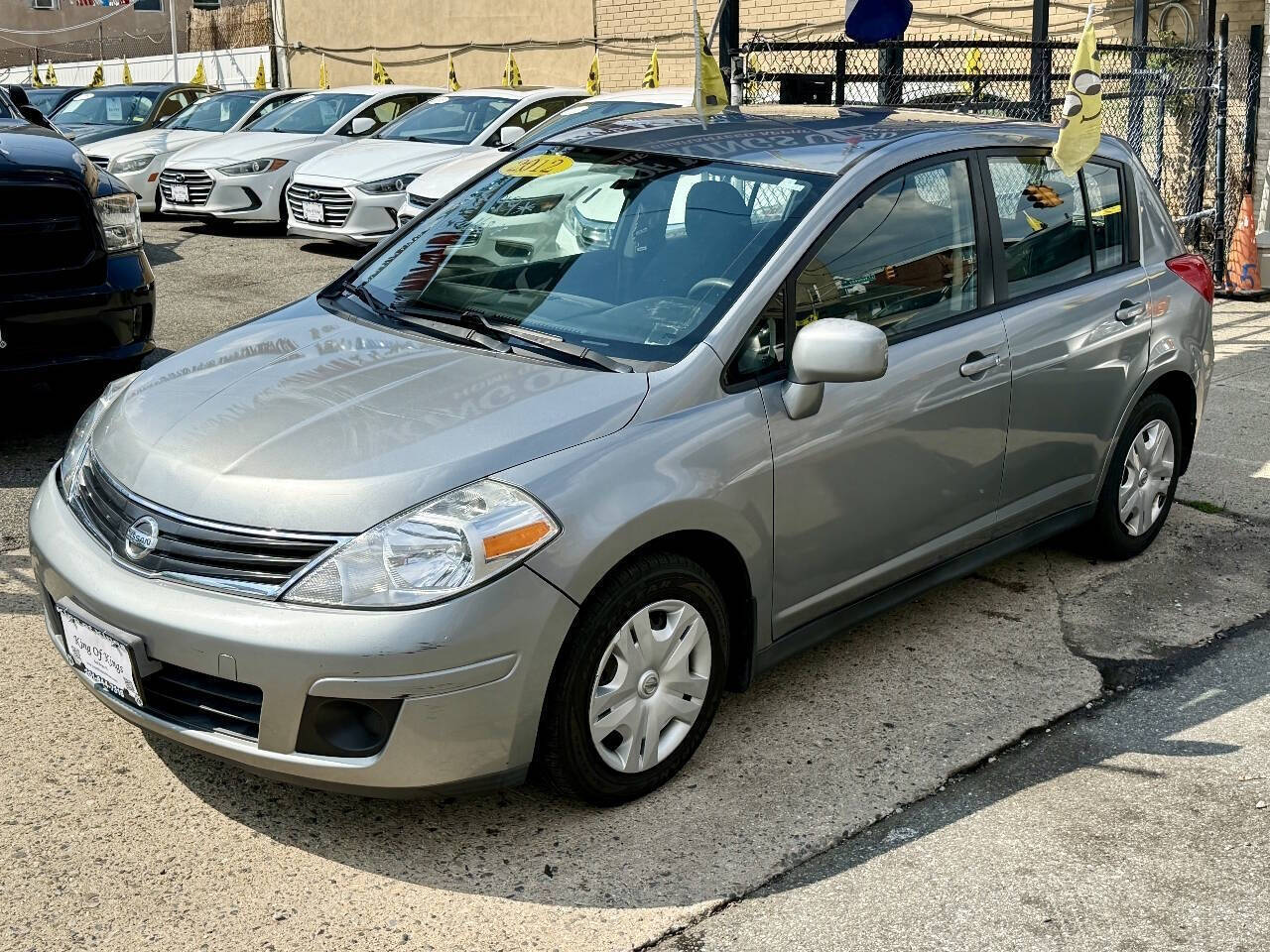 2012 Nissan Versa 1.8 S 4dr Hatchback 4A - Magnetic Gray exterior view 4