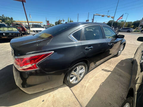 2013 Nissan Altima for sale at Buy-Fast Autos in Houston TX