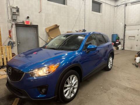 2014 Mazda CX-5 for sale at United Motors in Saint Cloud MN